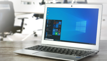 Laptop with operating system interface displayed on screen